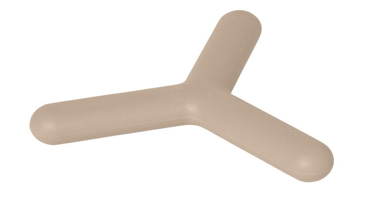 Untersetzer Flip 15 cm aus Silikon und Kunststoff in beige.