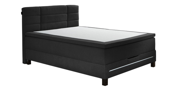 Boxspringbett Jogi in Anthrazit aus einem Stoffbezug mit einer Lichtleiste im Fußteil.