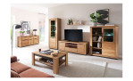 Beleuchtete Wohnkombination im Wohnzimmer aus Highboard, Lowboard, Wandboard, Vitrine, Sideboard und Couchtisch.