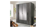 Drehtürenschrank Dora in der Farbausführung Graphit / Sigi-Steel-Optik mit zwei Spiegeltüren in einem Raum stehend
